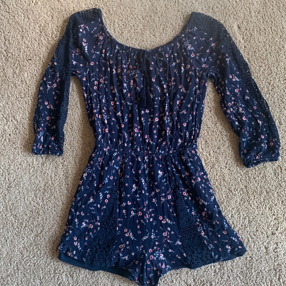 Navy blue romper with pink flowers and lace